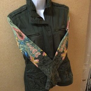 Woman's unique army jacket with beautiful sweater sleeves